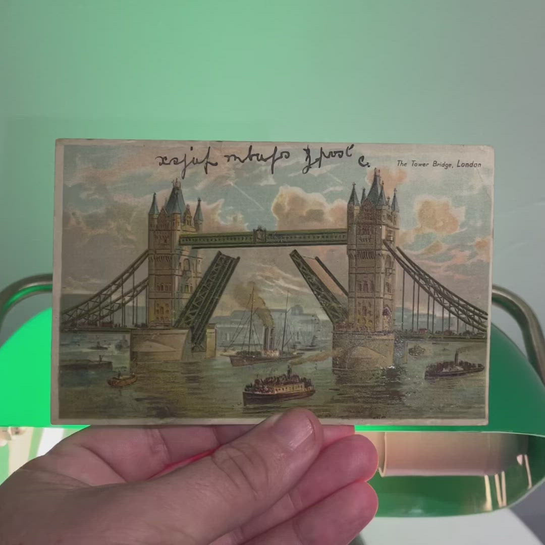 London Bridge hold to light postcard